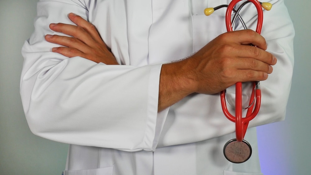 Professional reviewing health literature at desk